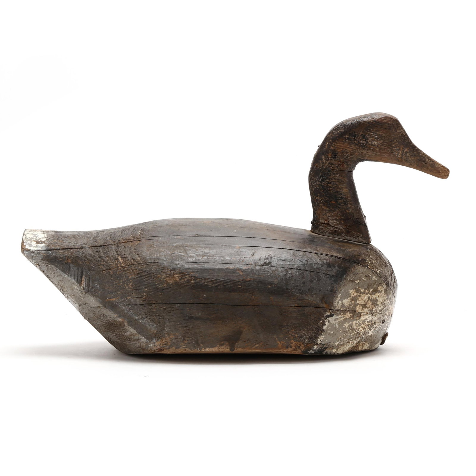 Early Outer Banks Goose: Early Outer Banks Goose Attributed to the northern Outer Banks or Virginia's Back Bay, circa 1930s, carved and painted wood. Length 19 in. x 11 x 9 From a Private Collection donated to benefit the con