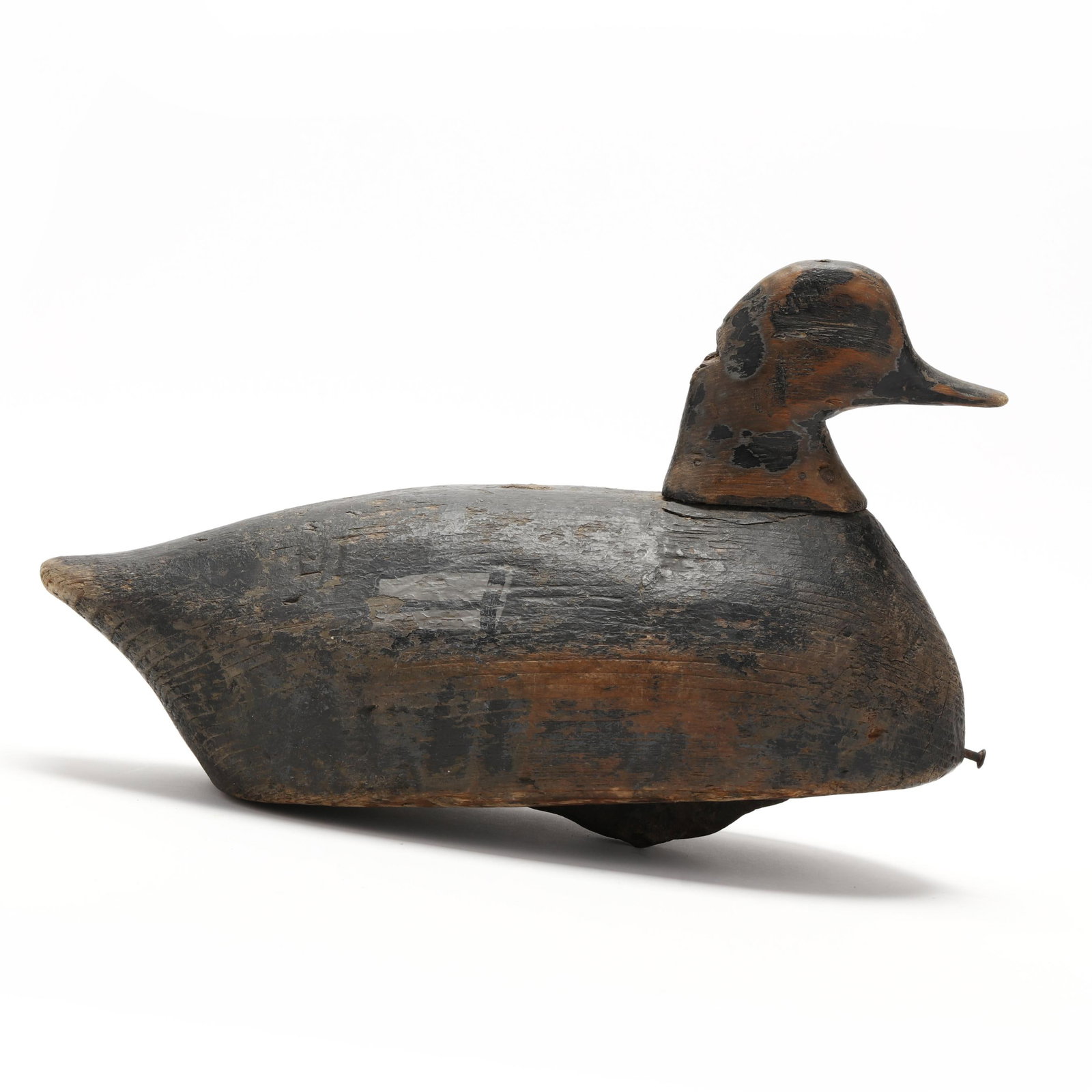 Attributed Jasper "Bode" White (NC, 1861-1931), Redhead: Attributed Jasper "Bode" White (NC, 1861-1931), Redhead New Currituck Inlet, North Carolina, circa 1900, carved and painted wood. Length 15.5 in. x 9.5 x 7 An early market hunting decoy. From a Privat