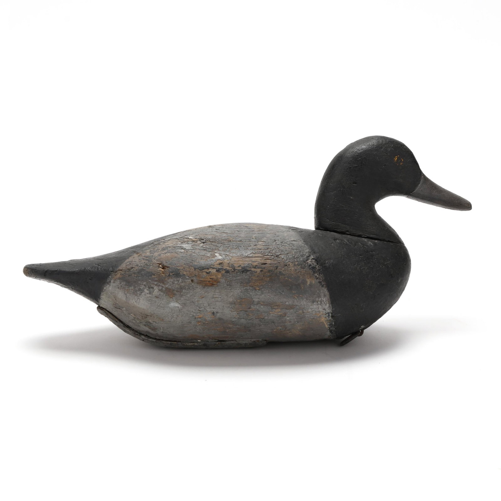 Early Holly Family Bluebill: Early Holly Family Bluebill Havre de Grace, Maryland, circa 1900, carved and painted wood, incised illegible brand. Length 14.5 in. x 7.5 x 6 From a Private Collection donated to benefit the
