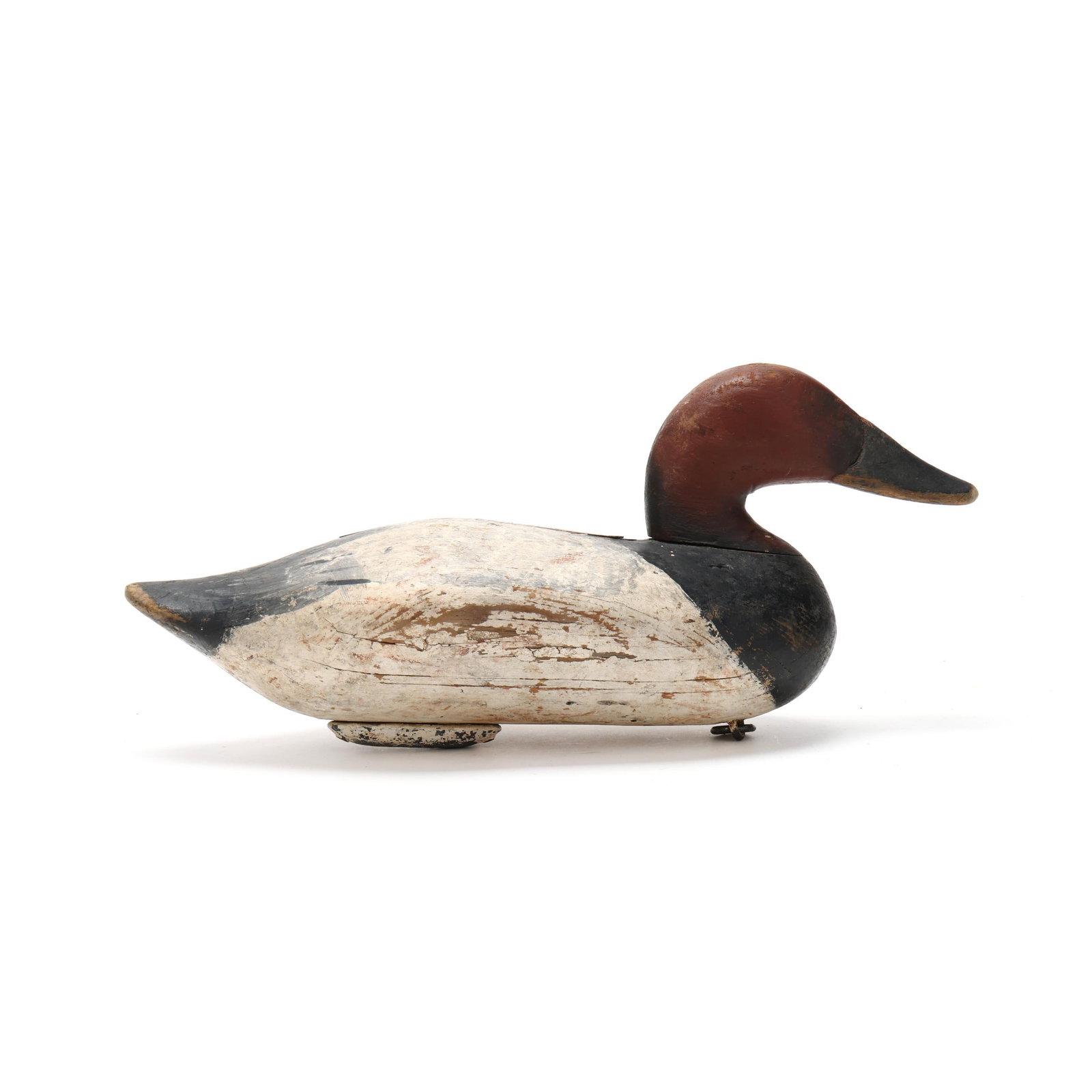 Madison Mitchell (MD, 1901-1993), Canvasback: Madison Mitchell (MD, 1901-1993), Canvasback Havre de Grace, Maryland, circa 1950s, carved and painted wood, unknown collectors brand on the bottom. Length 15 in. x 7 x 6.5 From a Private Collection d