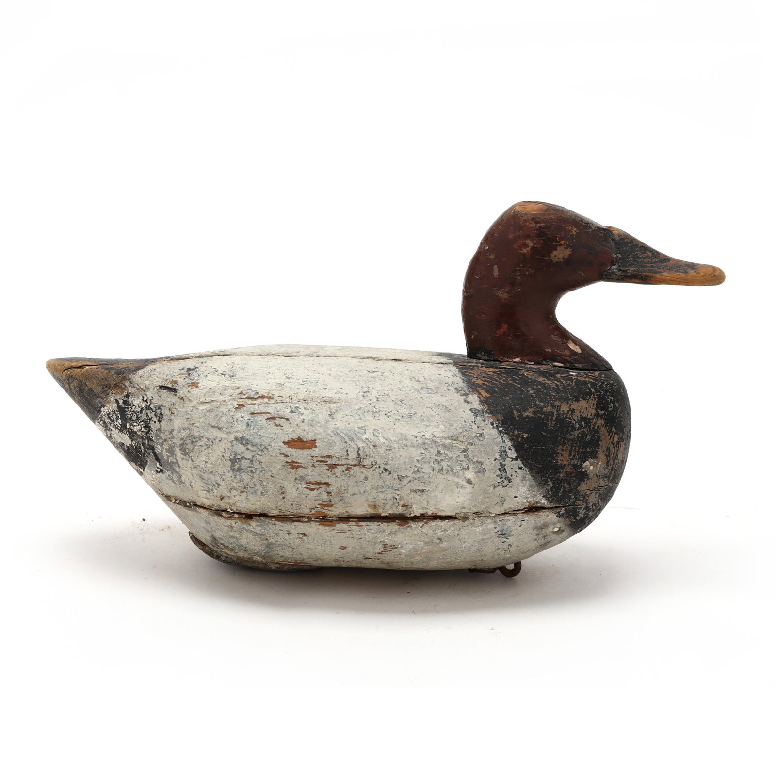 Early Upper Bay Canvasback: Early Upper Bay Canvasback Upper Bay, Maryland, circa 1920s, carved and painted wood. Length 14 in. x 8 x 7 Additional high-resolution photos are available at www.lelandlittle.com