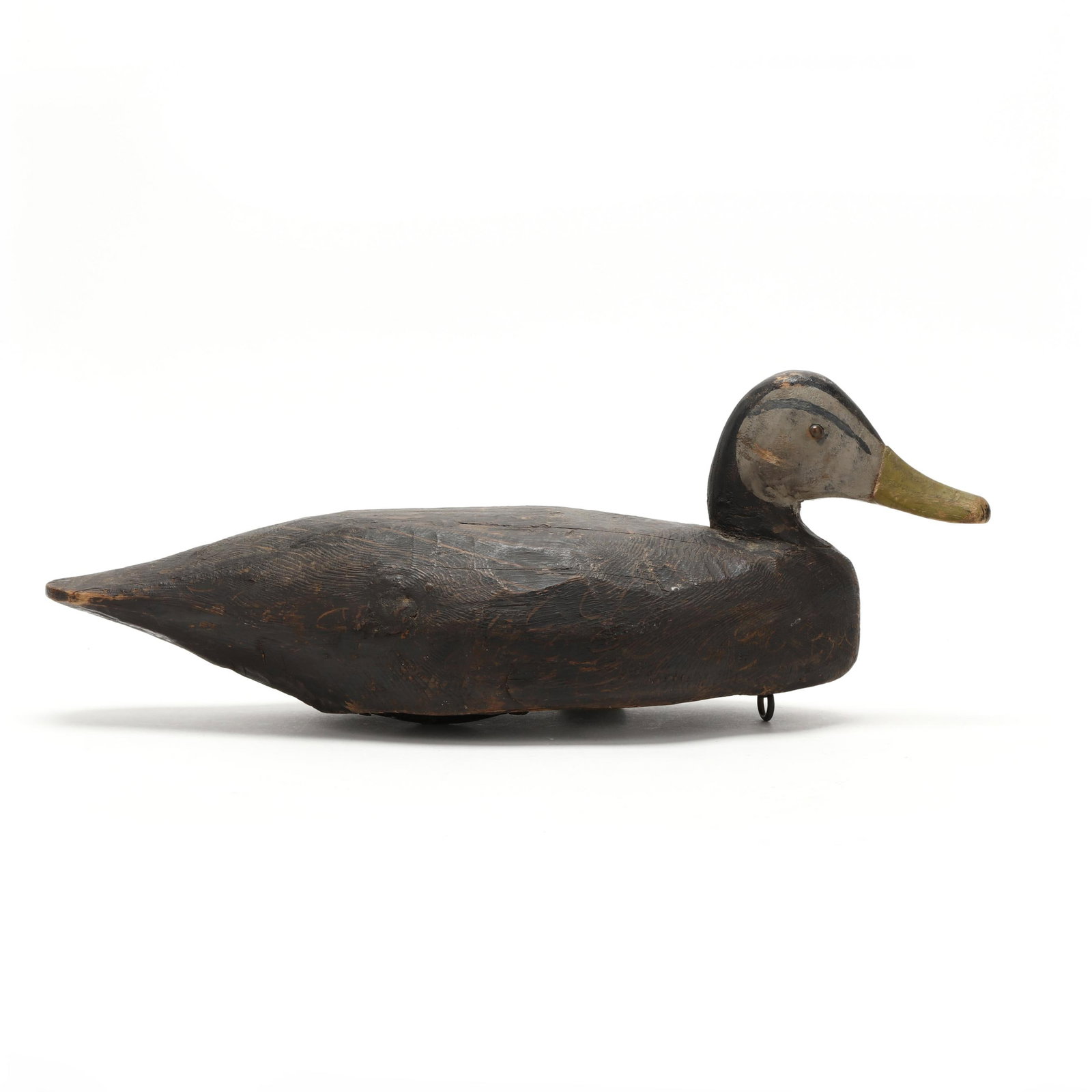 Miles Hancock (VA, 1887-1974), Black Duck: Miles Hancock (VA, 1887-1974), Black Duck Chincoteague, Virginia, circa 1930a, carved and painted wood, tack eyes. Length 20 in. x 7 x 7 From a Private Collection donated to benefit the conservation e
