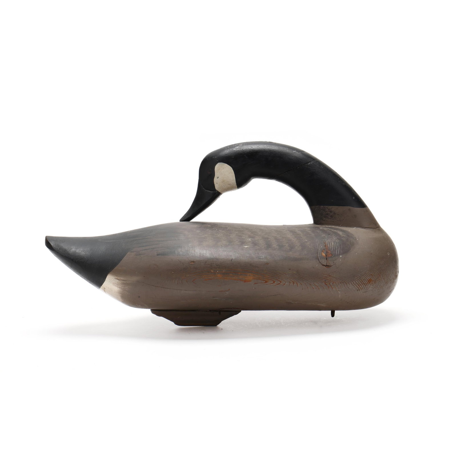 Paul Gibson (MD, 1902-1984), Preening Goose: Paul Gibson (MD, 1902-1984), Preening Goose Havre de Grace, Maryland, circa 1960s, carved and painted wood. Length 20.5 in. x 10 x 8 From a Private Collection donated to benefit the conservation effor