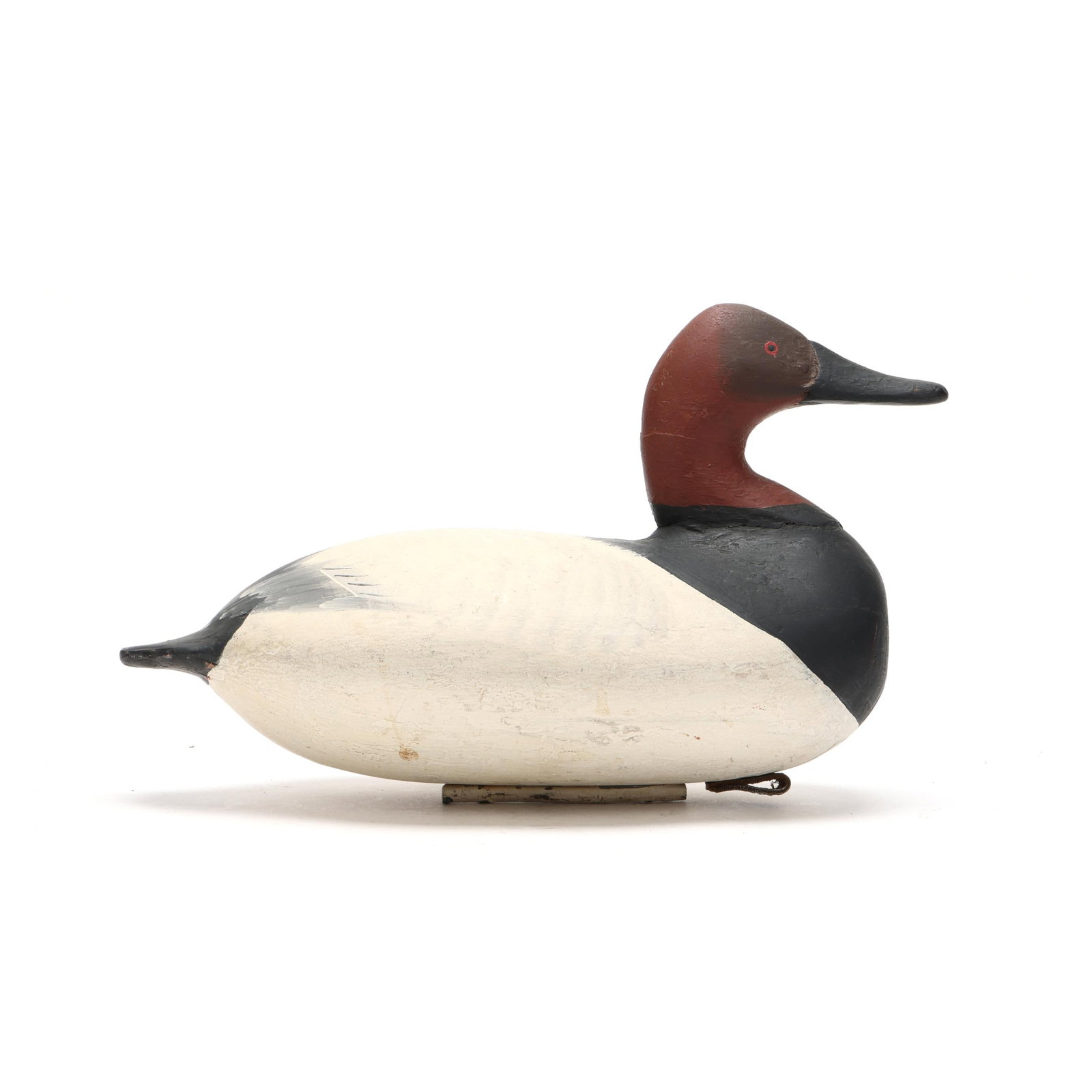 Early Maryland Canvasback: Early Maryland Canvasback Upper Bay, Maryland, circa 1920s, carved and painted wood. Length 14.75 in. x 9 x 7 From a Private Collection donated to benefit the conservation efforts of Ducks Unlimited, 