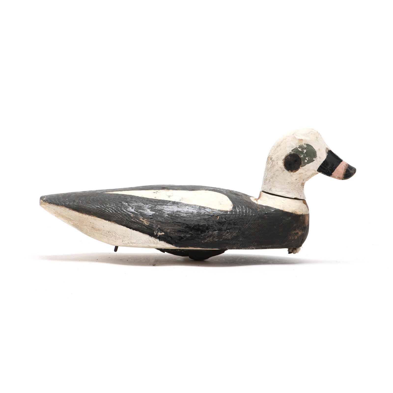 Early Old Squaw: Early Old Squaw Iles de la Madeleine, Canada, circa 1940, carved and painted wood, signed and dated 1-07-40. Length 14.25 in. x 6.5 x 6 From a Private Collection donated to benefit the conservation ef