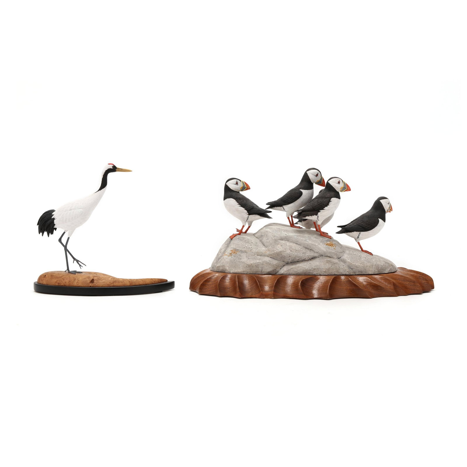 M.K. Scheel (PA), Puffins and Japanese Crane: M.K. Scheel (PA), Puffins and Japanese Crane Quakertown, Pennsylvania, circa 1990, carved and painted wood, signed. Puffins length 11.5 in. x 6 x 6 Crane length 7 in. x 6.5 x 3 Additional high-resolut