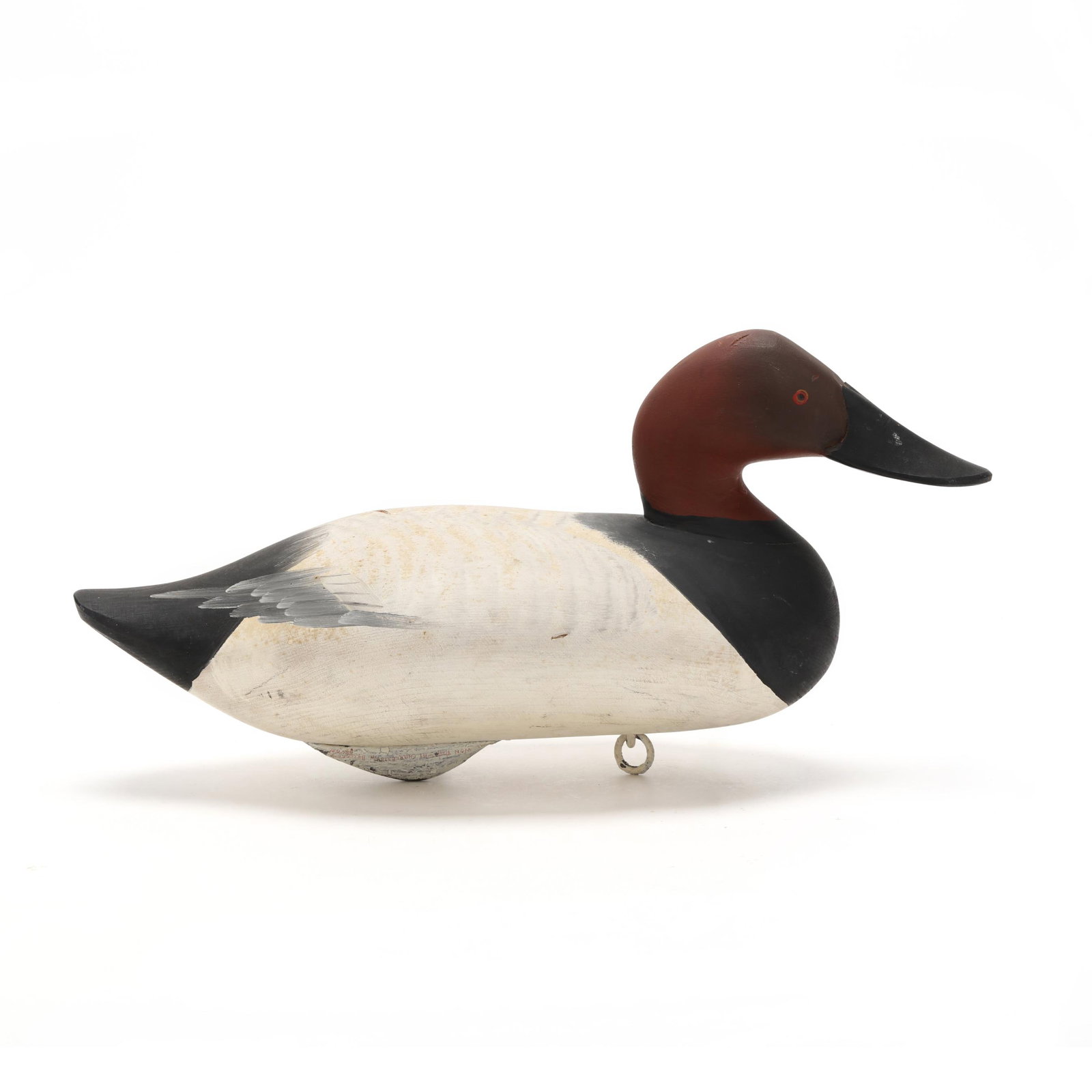 Madison Mitchell (MD, 1901-1993), Canvasback: Madison Mitchell (MD, 1901-1993), Canvasback Havre de Grace, Maryland, circa 1970, carved and painted wood. Length 16 in. x 7.5 x 6.5 Head turned to the right. Additional high-resolution photos are av