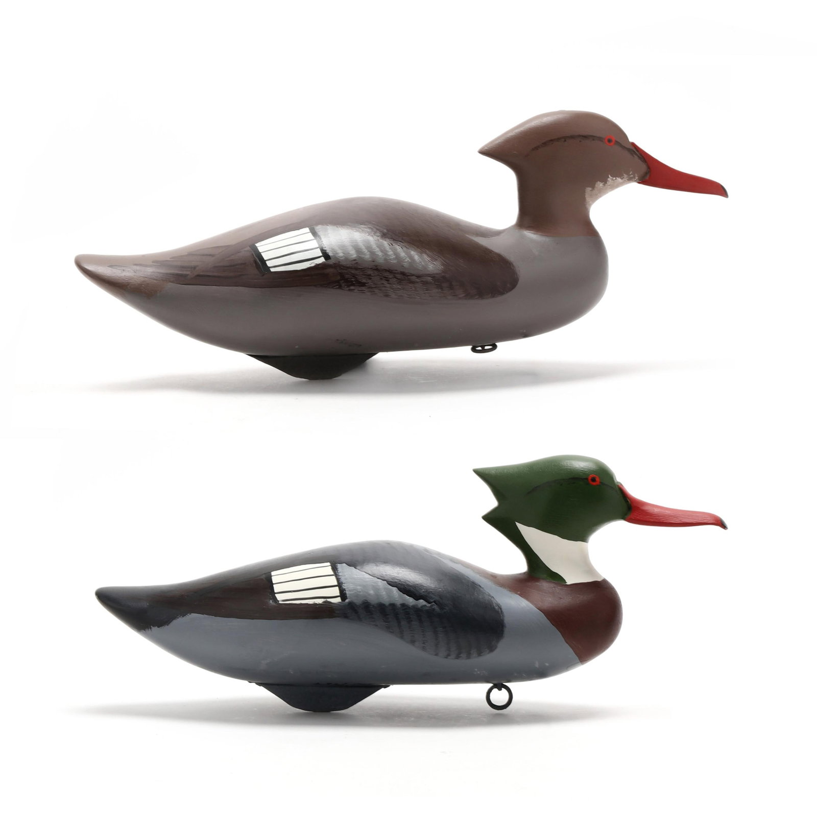 Captn Harry Jobes (MD, 1936-2019), Pair of Mergansers: Captn Harry Jobes (MD, 1936-2019), Pair of Mergansers Havre de Grace, Maryland, 1990, carved and painted wood, signed and dated. Length 17.5 in. x 7 x 7.5 Additional high-resolution photos are availab