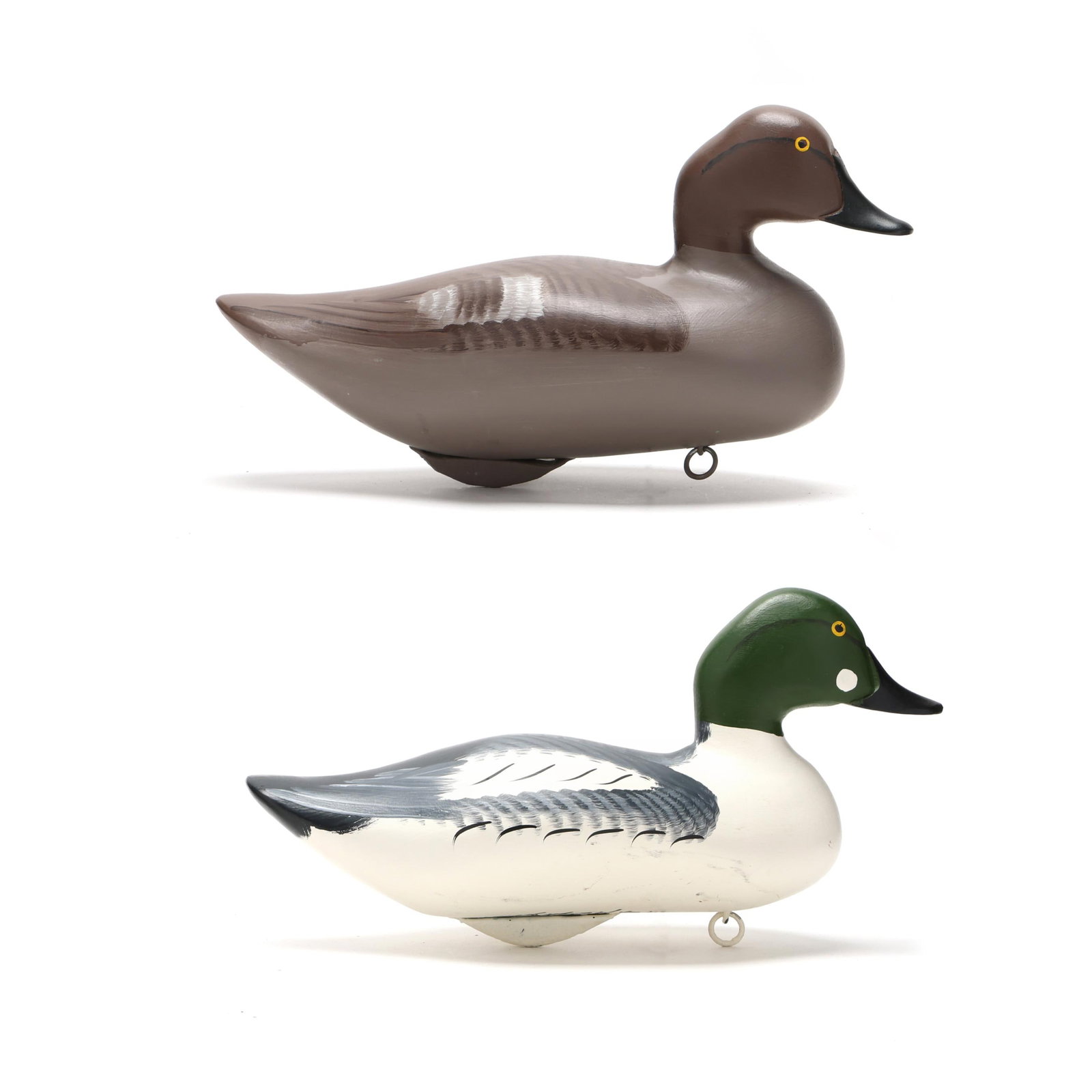 Harry Jobes (MD, 1936-2019), Pair Goldeneye: Harry Jobes (MD, 1936-2019), Pair Goldeneye Havre de Grace, Maryland, 1990, carved and painted wood, signed. Length 14 in. x 7.5 x 6 Additional high-resolution photos are available at www.lelandlittle