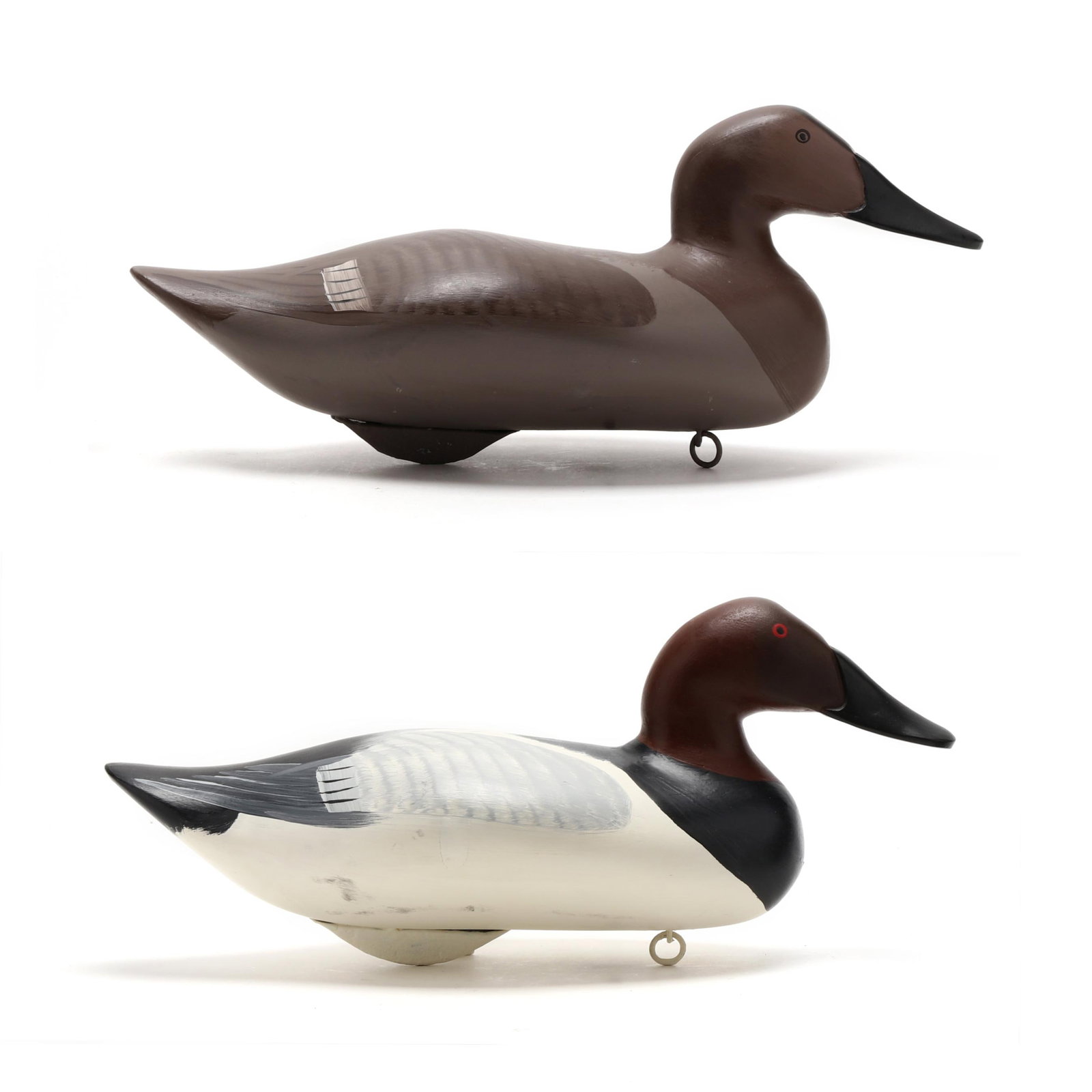 Captn Harry Jobes (MD, 1936-2019), Pair of Canvasbacks: Captn Harry Jobes (MD, 1936-2019), Pair of Canvasbacks Havre de Grace, Maryland, 1990, carved and painted wood, signed and dated. Length 16.5 in. x 7 x 7 Additional high-resolution photos are availabl