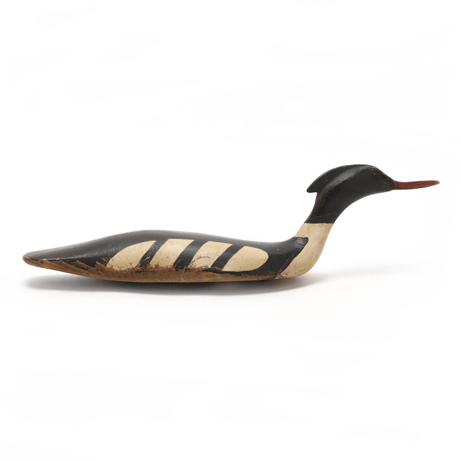 Andre Broussard (CA), Swimming Merganser: Andre Broussard (CA), Swimming Merganser Quebec, Canada, circa 1960, carved and painted wood, glass eyes. Length 19.5 in. x 5.5 x 5.5 Attractive swimming posture with head turn to the left. Additional