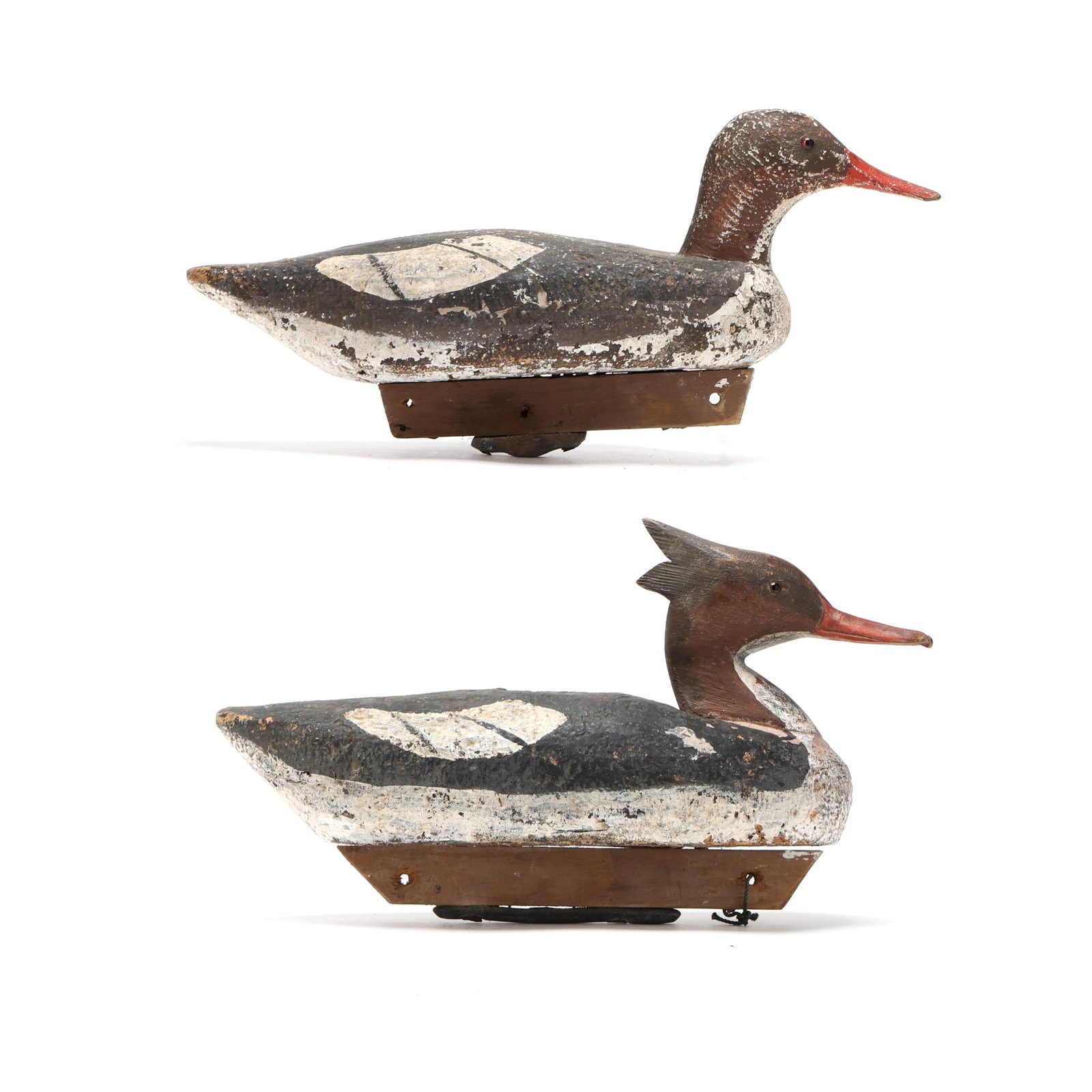 Pair of Hoopers Island Merganser: Pair of Hoopers Island Merganser Hoppers Island, Maryland, circa 1940s, carved and painted wood, and cork, glass eyes. Length 15 in. x 7 x 5 From a Private Collection donated to benefit the conservati