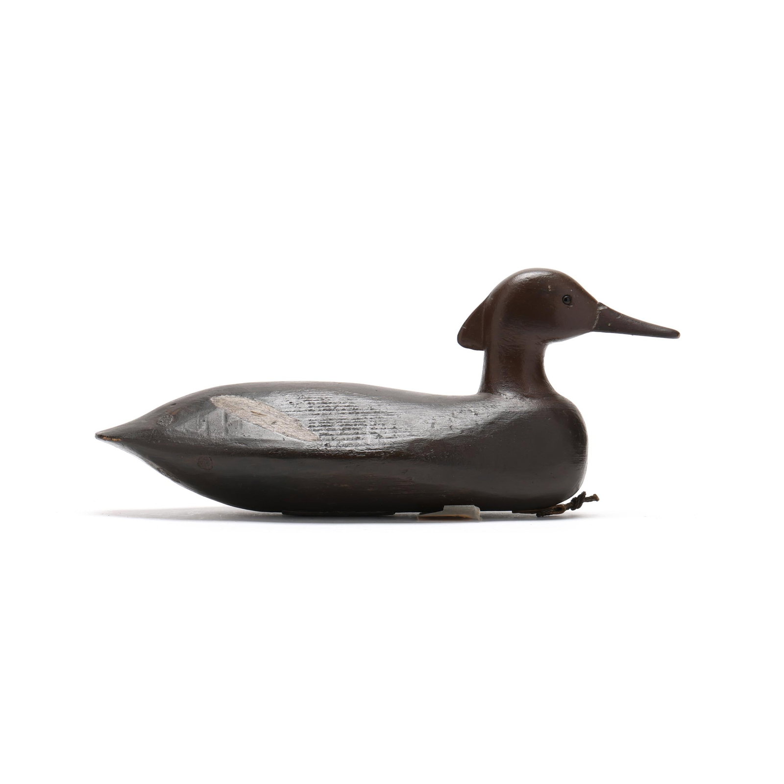 Early Delaware River School Hen Merganser: Early Delaware River School Hen Merganser Delaware River, circa 1900, carved and painted wood, glass eyes. Length 15.5 in. x 7.25 x 5 From a Private Collection donated to benefit the conservation effo