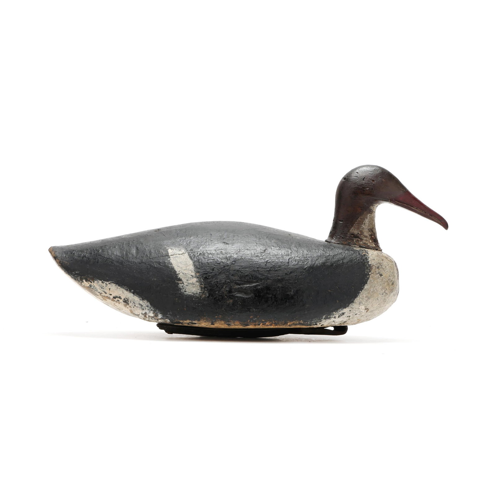 Early Hen Common Merganser: Early Hen Common Merganser Coastal Maine, circa 1920s, carved and painted wood. Length 17 in. x 7 x 7 From a Private Collection donated to benefit the conservation efforts of Ducks Unlimited, Inc.