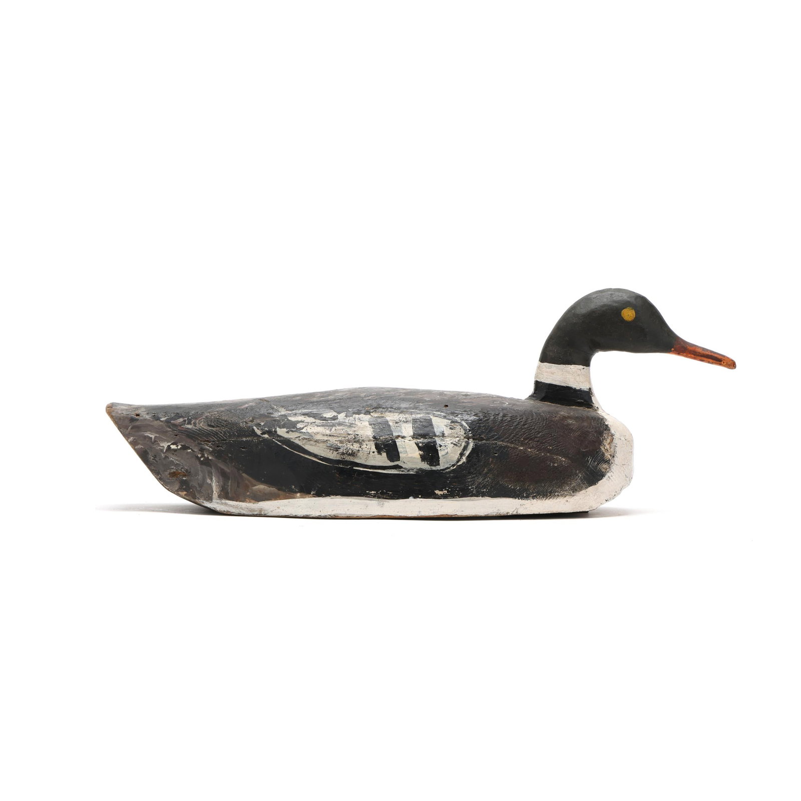Early Red Breasted Merganser: Early Red Breasted Merganser Maritime Canada, circa 1930s, carved and painted wood. Length 19.5 in. x 7.5 x 7 From a Private Collection donated to benefit the conservation efforts of Ducks Unlimited,