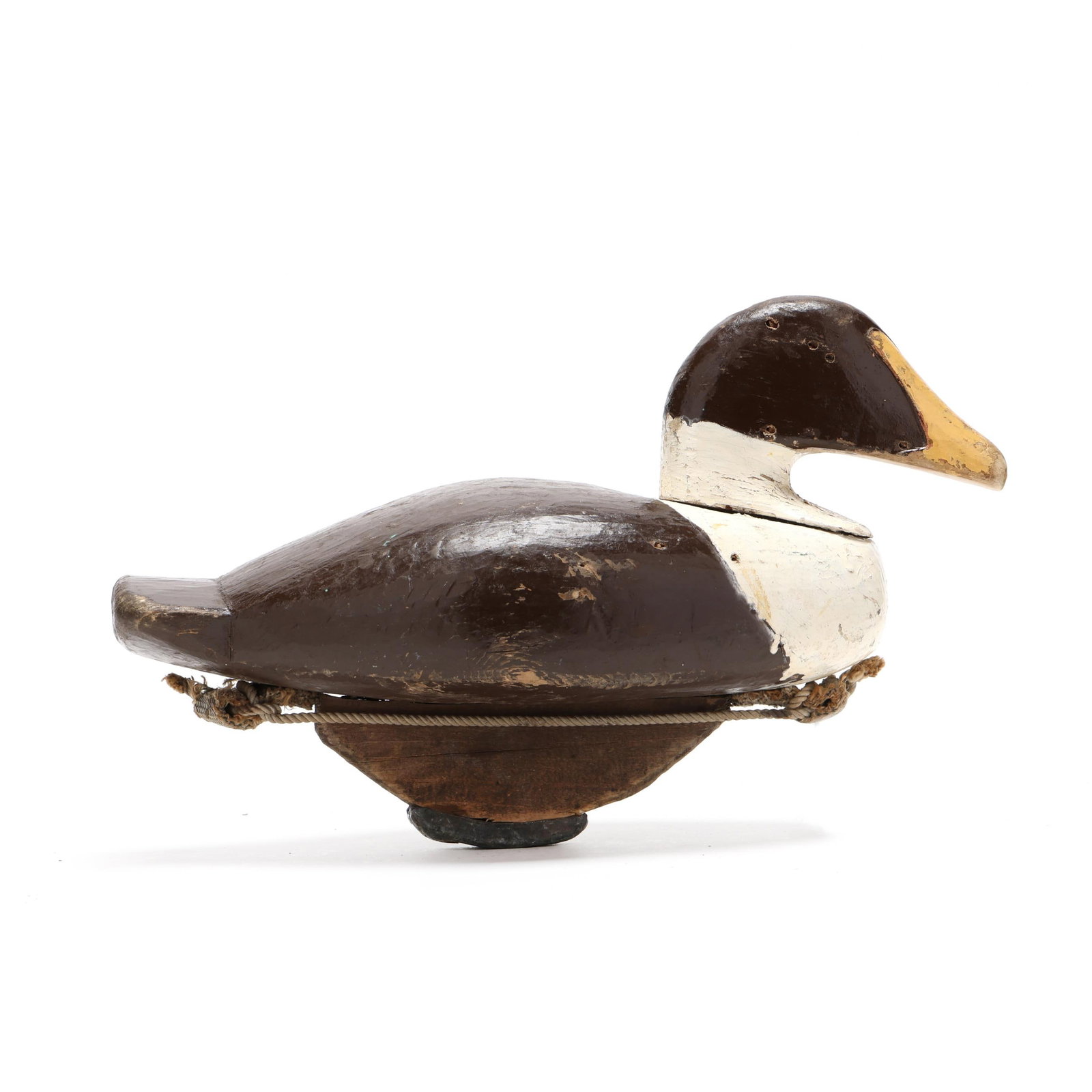 Early Common Eider: Early Common Eider Maritime Maine, circa 1930s, carved and painted wood Length 15 in. x 9 x 7 From a Private Collection donated to benefit the conservation efforts of Ducks Unlimited, Inc. Additional