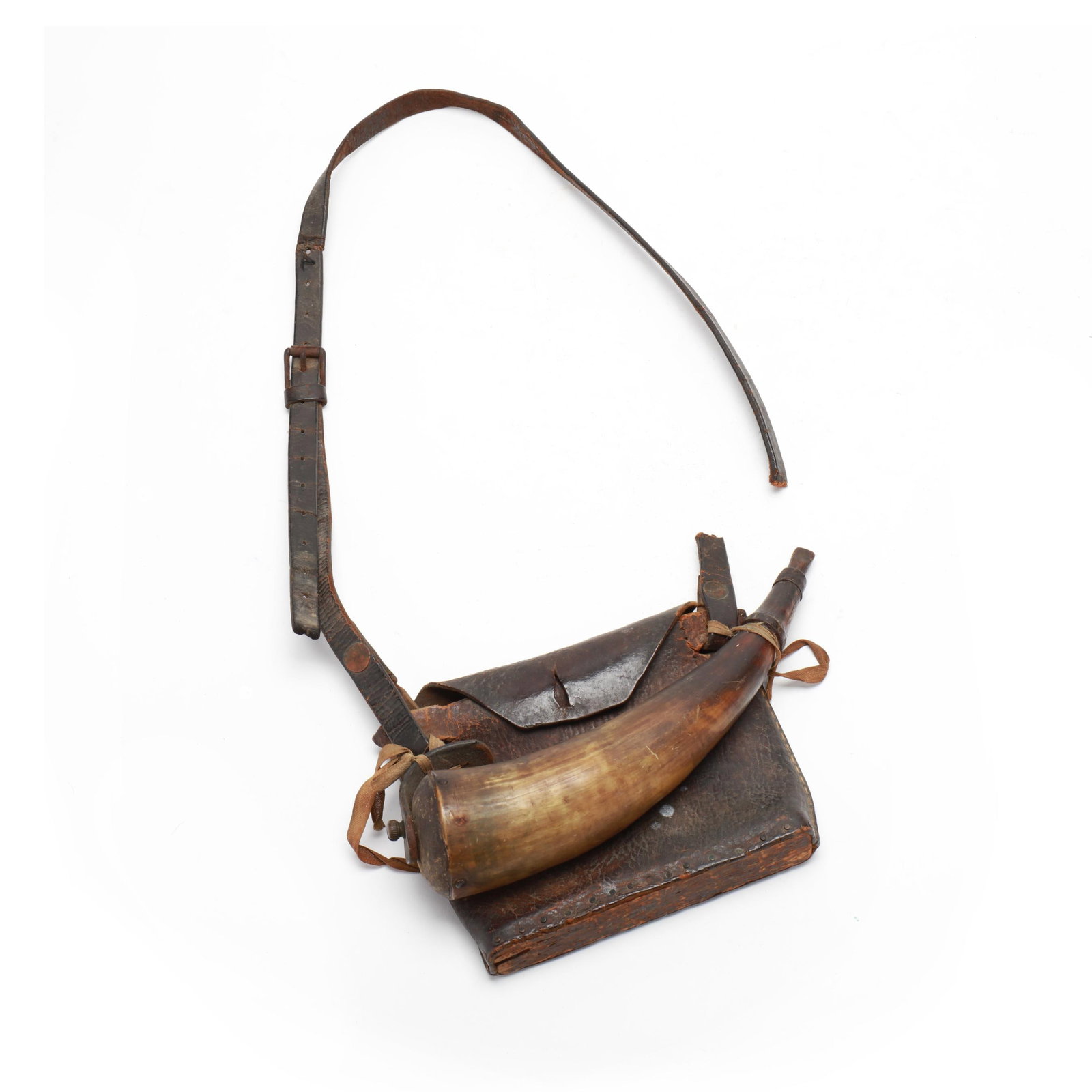 Early Piedmont North Carolina Powder Horn and Leather Bag: Early Piedmont North Carolina Powder Horn and Leather Bag Piedmont, North Carolina, circa 1830s, carved horn and wood, tooled leather. Horn length 10 in. x 2.25 Leather bag Length 7.5 in. x 6 Addition