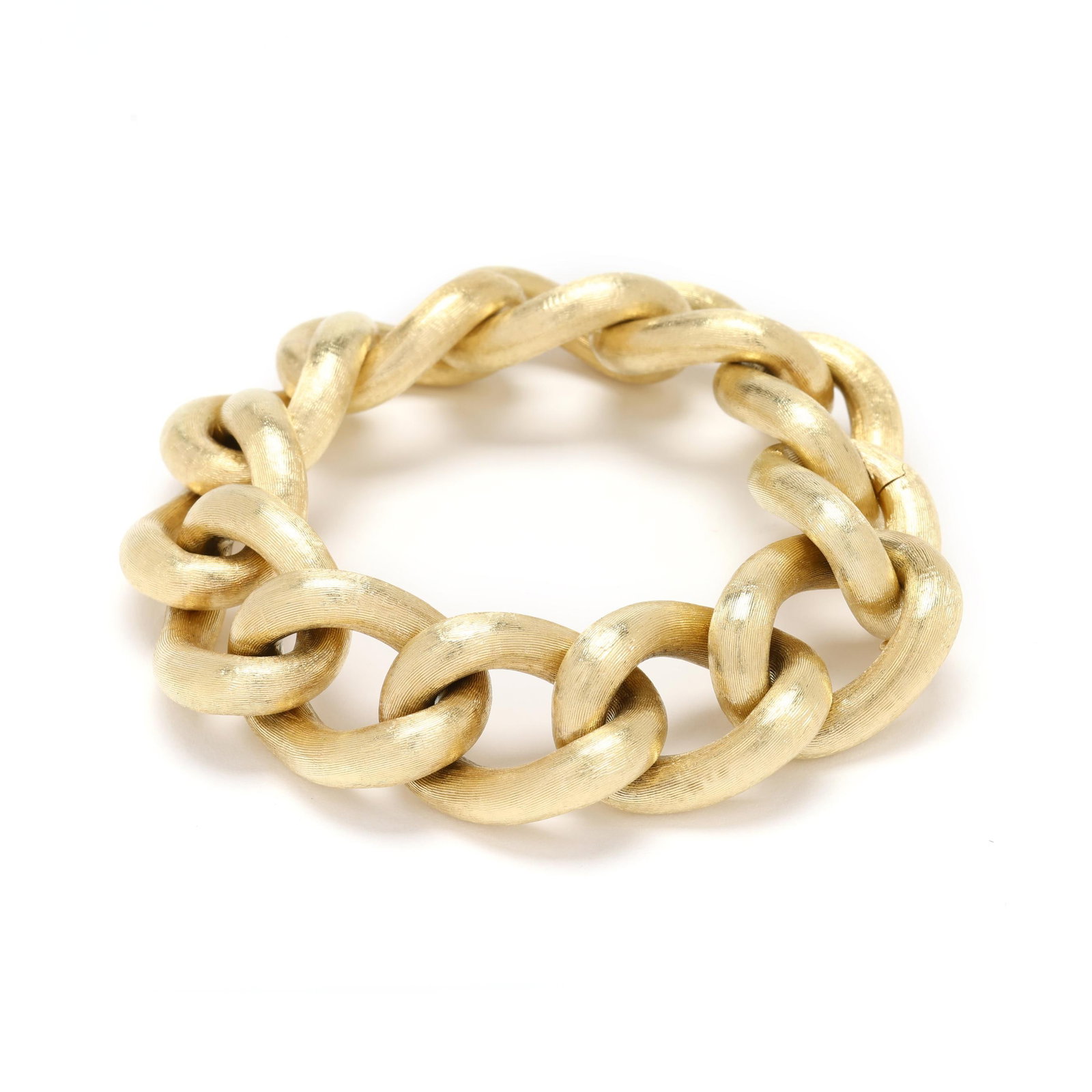 Gold Curb Link Bracelet, Unoaerre: Gold Curb Link Bracelet, Unoaerre textured oval curb links, completed with an integrated clasp with figure eight safety, stamped Italy, and with maker's mark, testing 14KT. .75 x 8.25 in. 32.1 dwt. Ad
