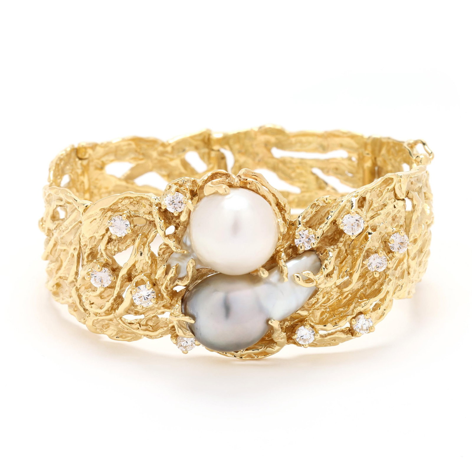 Gold, Baroque Pearl, and Diamond Bracelet, Arthur King: Gold, Baroque Pearl, and Diamond Bracelet, Arthur King the naturalistic design textured gold openwork bracelet with two central baroque pearls, the surround prong set with full cut round diamonds weig