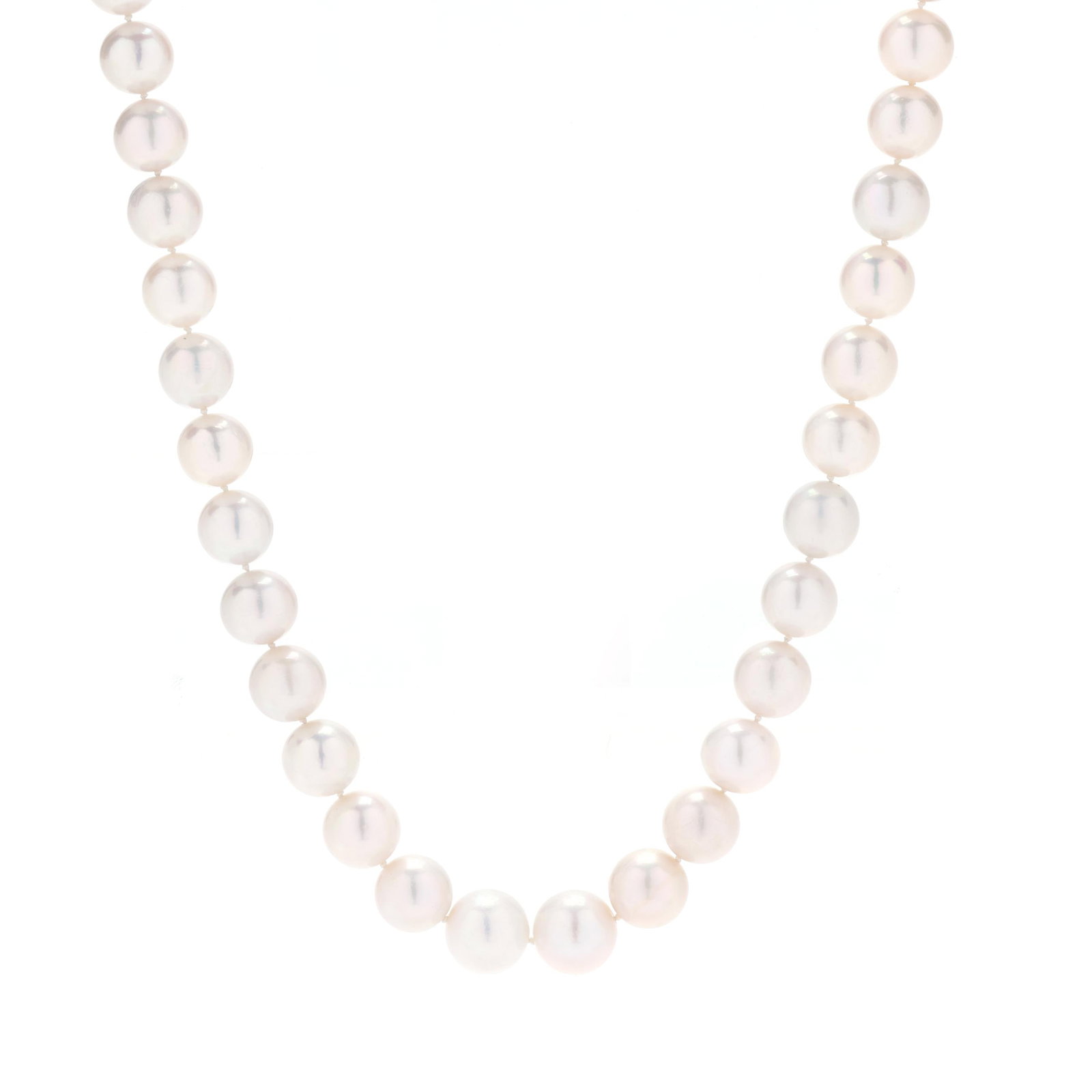 Long Graduated South Sea Pearl Necklace: Long Graduated South Sea Pearl Necklace single strand strung knotted with graduated round cultured South Sea pearls (12.0mm to 14.0mm), completed with an oval clasp stamped 18K / 750. 32.75 in. 107.8 
