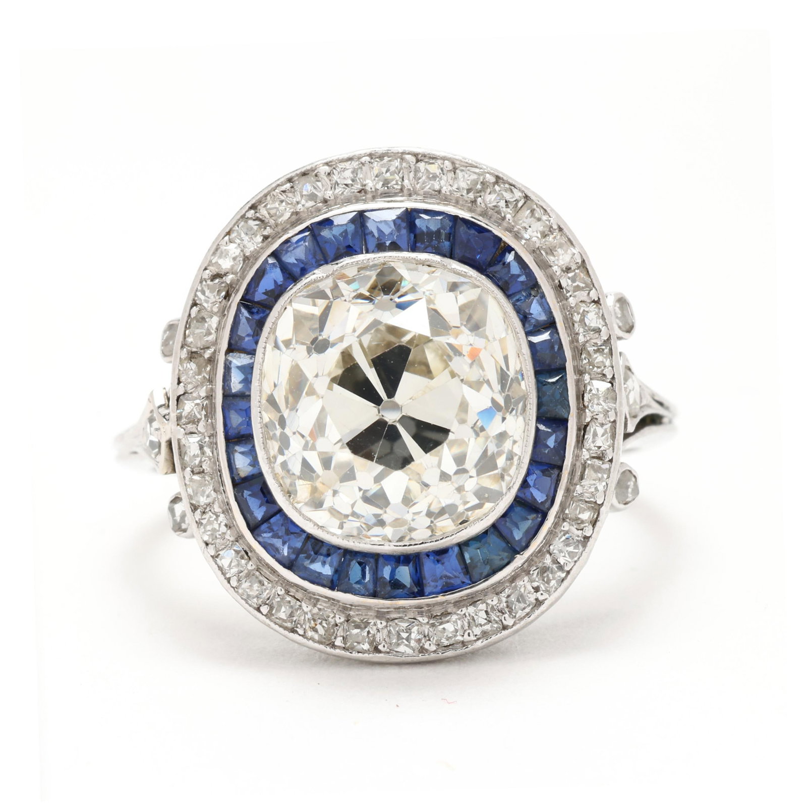 Antique Platinum, 3.69 Carat Old Mine Cut Diamond, and Sapphire Ring: Antique Platinum, 3.69 Carat Old Mine Cut Diamond, and Sapphire Ring