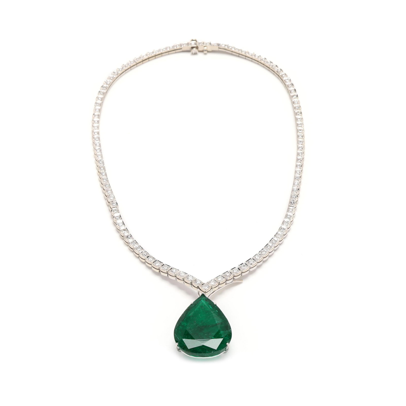 White Gold, Emerald, and Diamond Necklace: White Gold, Emerald, and Diamond Necklace with a pear cut emerald (32.3 x 24.35 x 9.75mm) weighing approximately 40.0 carats suspended from a white gold rivière necklace set with full cut round diamo