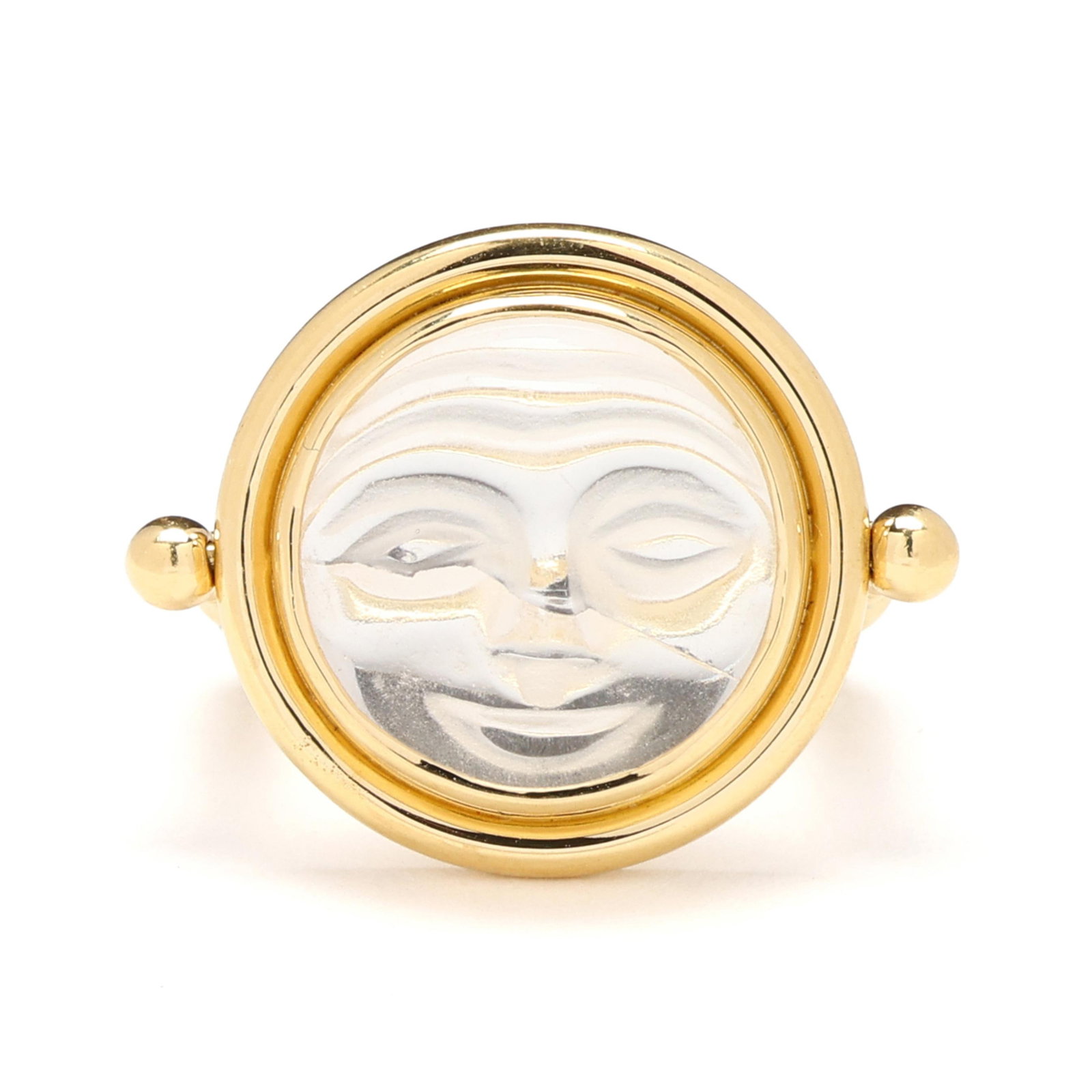 Gold and Rock Crystal Quartz Man in the Moon Ring, Temple St. Clair: Gold and Rock Crystal Quartz Man in the Moon Ring, Temple St. Clair carved rock crystal quartz in a man-in-the-moon motif, bezel set in a conforming surround, on a hinged and shaped shank, stamped
