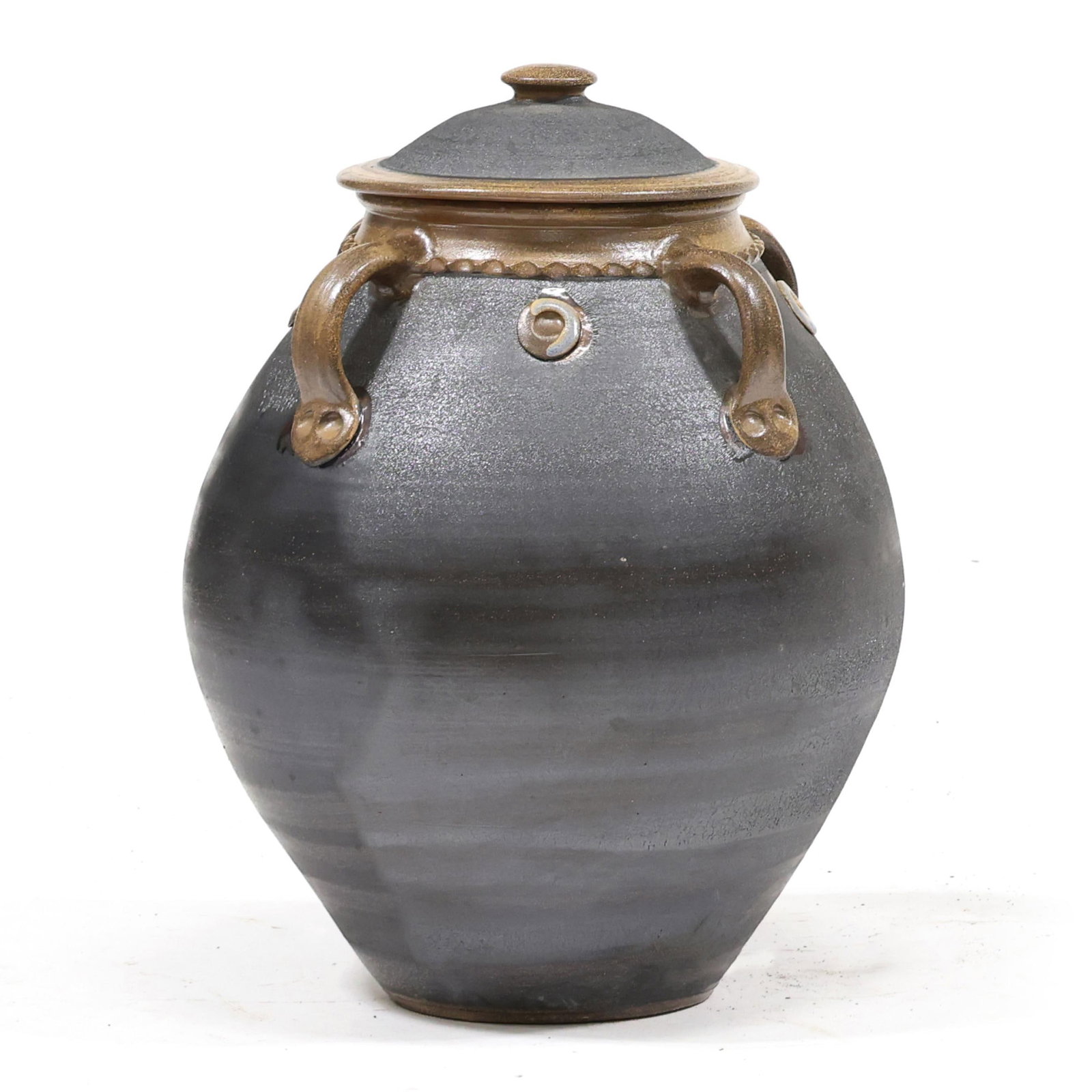 Mark Hewitt (NC, b. 1955), Early Large Four Handled Floor Urn with Cover: Mark Hewitt (NC, b. 1955), Early Large Four Handled Floor Urn with Cover Pittsboro, salt glazed stoneware with dark manganese over glaze, 1984-1995 potter's glyph to the underside, turned as an ovoid 