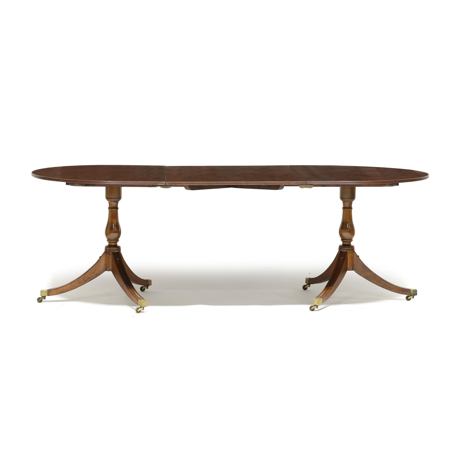 Georgian Style Burl Wood Double Pedestal Table with Leaf: Georgian Style Burl Wood Double Pedestal Table with Leaf mid-20th century, high grade burl yew wood veneer, banded top, baluster pedestal, tripod base with brass casters, together with one leaf, with 
