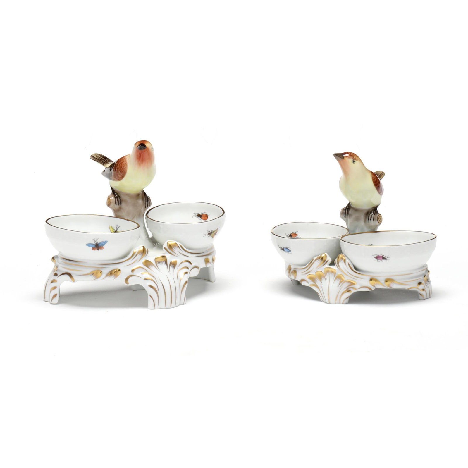 Two Herend Rothschild Bird Double Salt Dips: Two Herend Rothschild Bird Double Salt Dips Hungary, hand-painted and gilt porcelain, both #257, featuring two open oval wells on either side of a figural bird on a branch, raised on four feet, decora