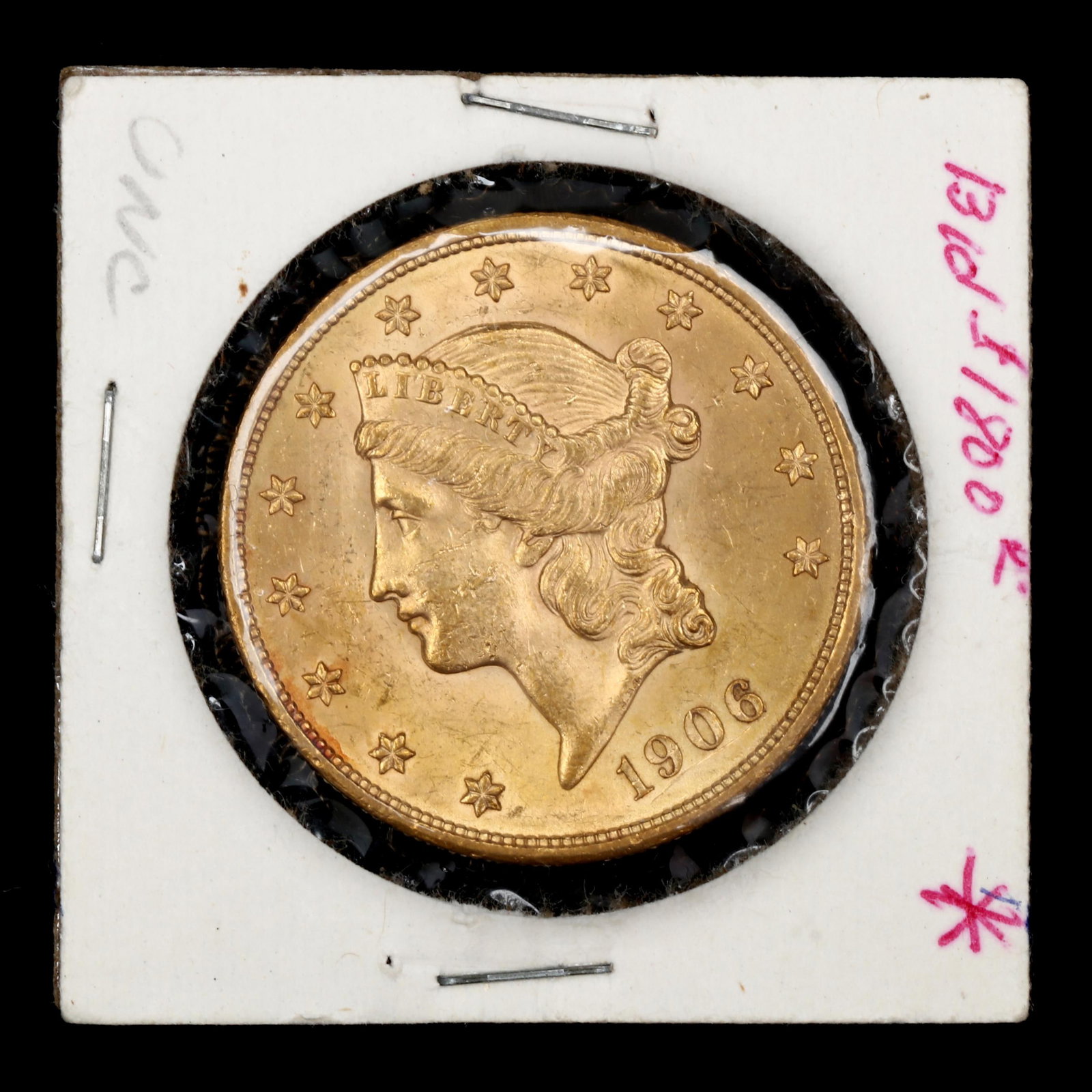 1906-D $20 Gold Double Eagle: 1906-D $20 Gold Double Eagle uncirculated, however has some bag marks and a scratch below the date. .900 fine gold verified. 1 X 2 X 2 IN. AGW (Actual Gold Weight): .9675 ozt Private North Carolina Co