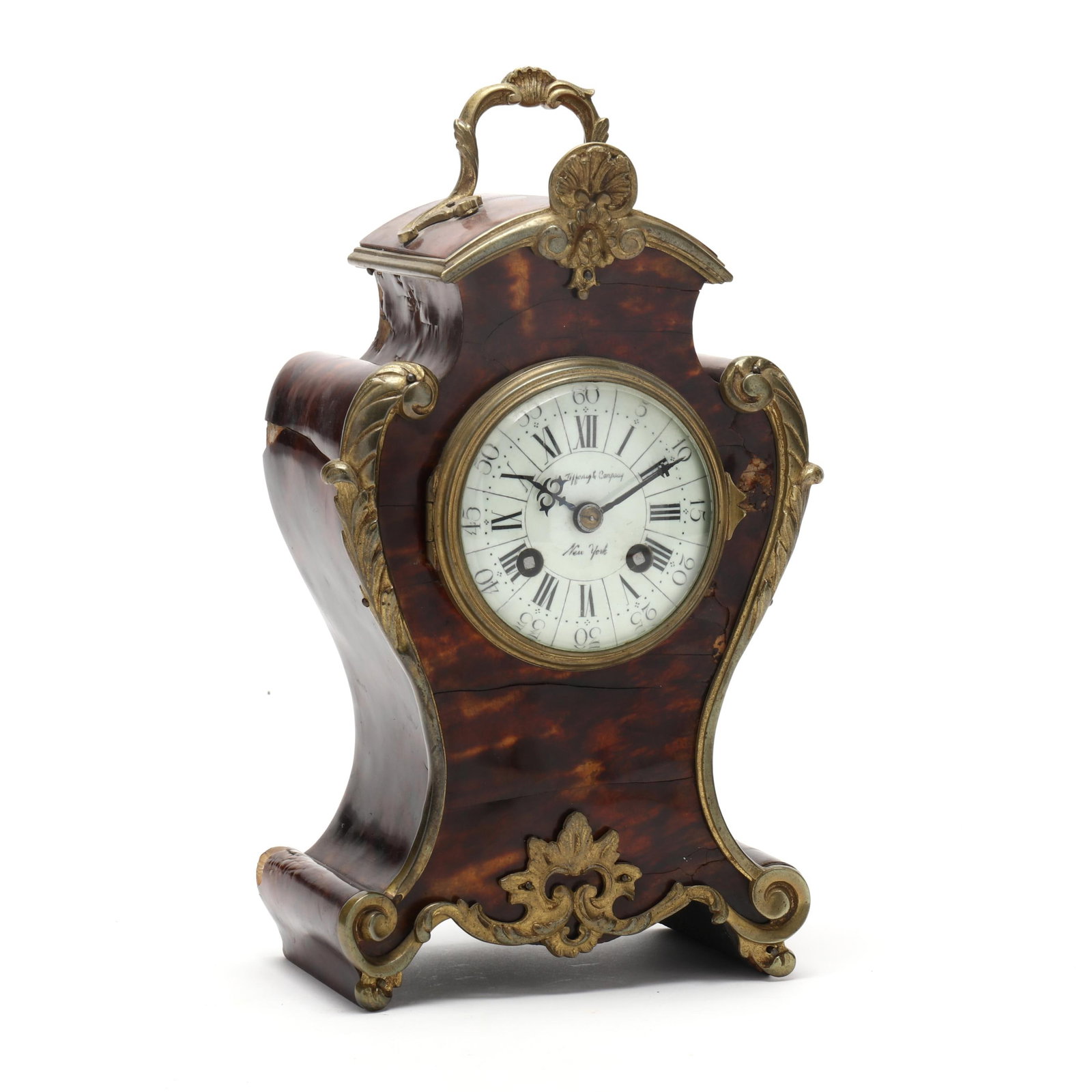 Louis XV Style Ormolu Mounted Mantel Clock, Signed Tiffany & Co.: Louis XV Style Ormolu Mounted Mantel Clock, Signed Tiffany & Co. circa 1900, shell veneered wood case, with scrolled leafy ormolu bronze mounts, 3 1/2-inch enameled dial signed Tiffany & Company / New