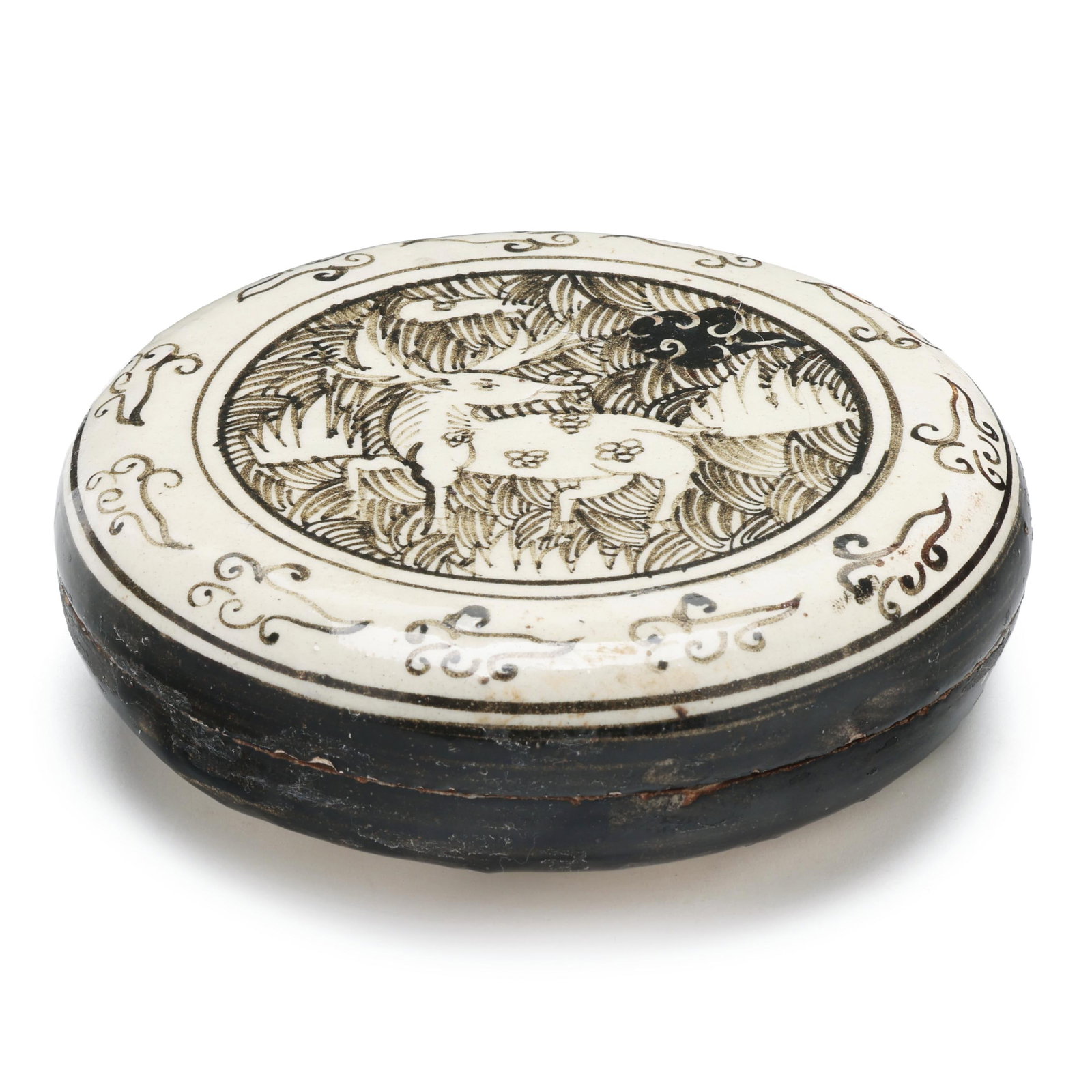 A Chinese Cizhou Painted Circular Box with Cover: A Chinese Cizhou Painted Circular Box with Cover probably Northern Song or Jin dynasty, 13th century, circular stoneware box decorated with dark brown glaze and creamy white slip, the cover with a cen
