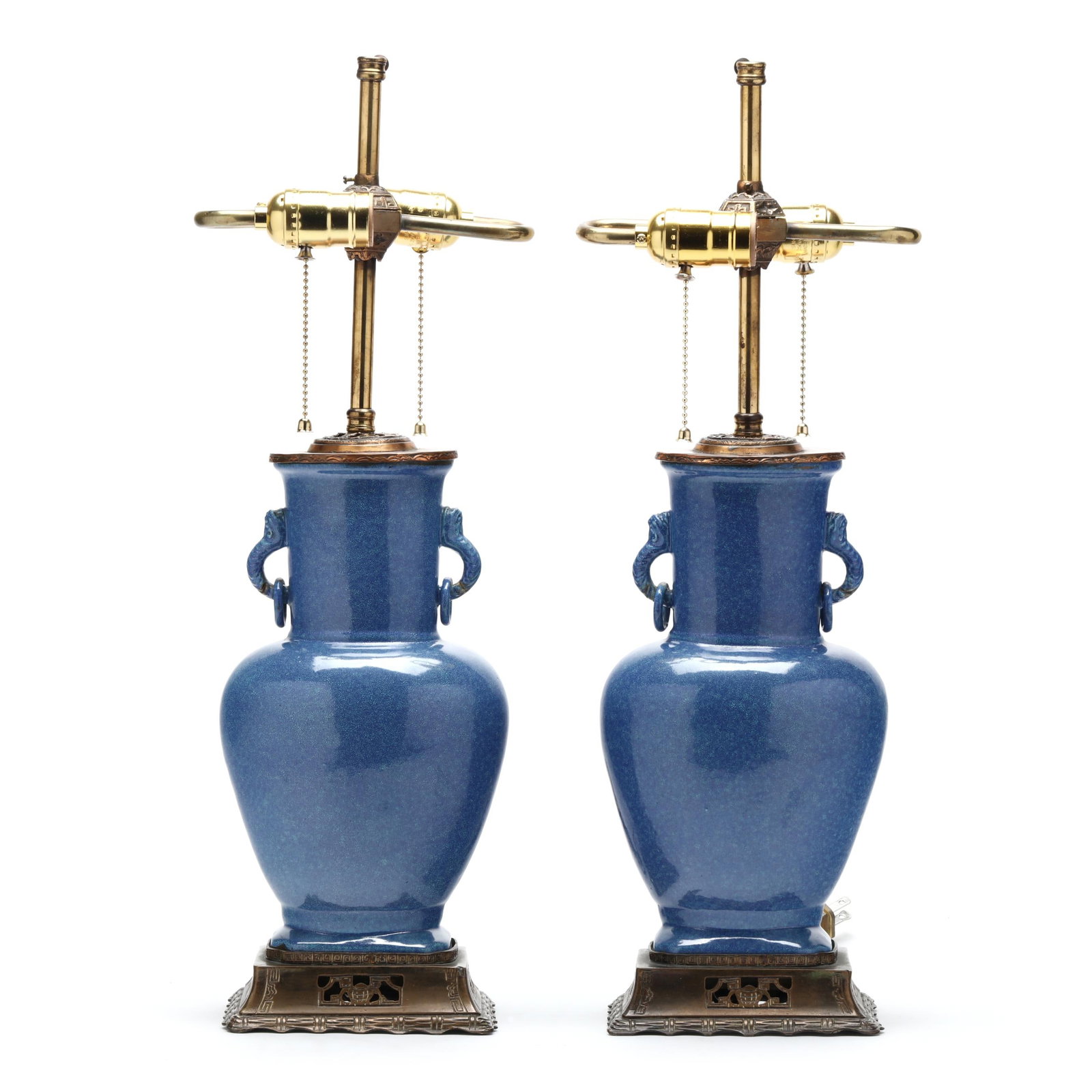 A Pair of Chinese Powder Blue Elephant Handle Vase Lamps: A Pair of Chinese Powder Blue Elephant Handle Vase Lamps Qing dynasty (1644-1912), late 19th century, each porcelain vase covered in a rich mottled powder blue glaze, the neck flanked by a pair of mol