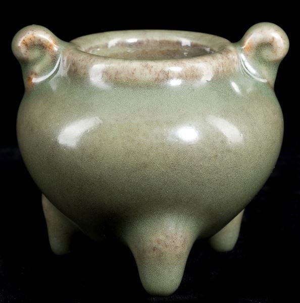 Chinese Celadon Glazed Censer: Chinese Celadon Glazed Censer raised on tripod foot, with two applied handles, incised mark to interior, presented in a custom fitted box with glass front. 3 1/8 in. Very attractive thick and "sugary"
