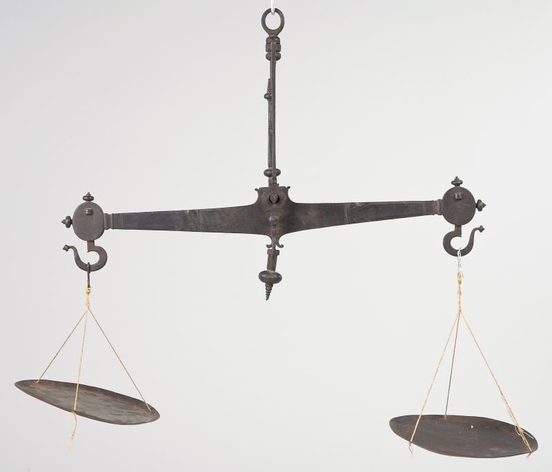 Large Wrought Iron Balance Scales: Large Wrought Iron Balance Scales highly crafted with graduated finials and whimsical decoration on both sides of the beam. LOA 32 in. Deaccessioned from MESDA