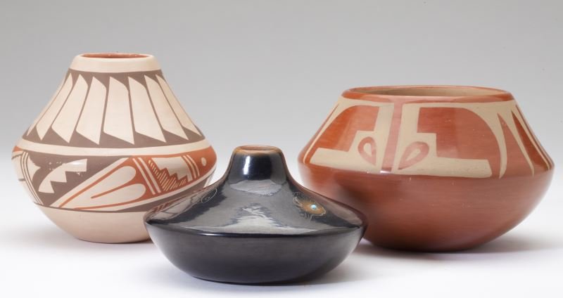 Three Signed Pueblo Ceramics: Three Signed Pueblo Ceramics20th century, the first a San Ildefonso spouted vessel signed and dated "Than-Moo-Whe / 3-30-78" by Barbara Gonzales, inlaid with a tiny bead of turquoise (4.25 diameter);