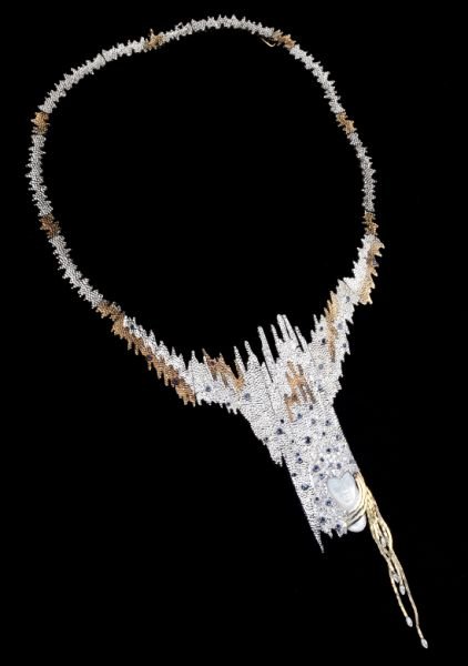 "Sophistication" Necklace, Erte: "Sophistication" Necklace, Ertefrom the "Sophistication" collection and designed in silver and yellow gold, accented with sapphires and diamonds and with a carved female profile of mother-of-pearl , n