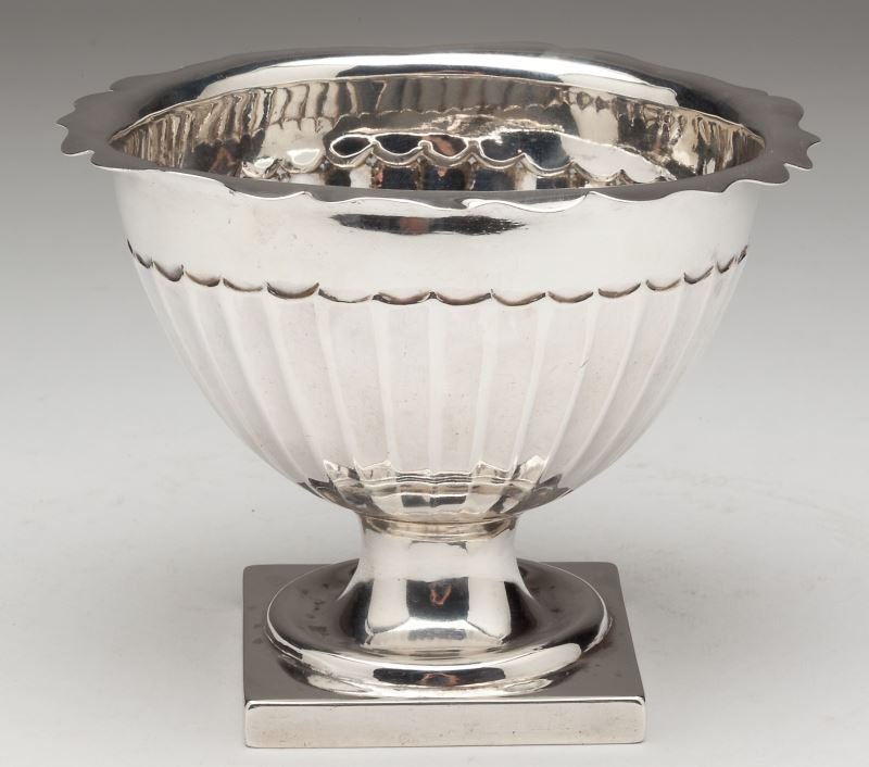 George III Sugar Bowl: George III Sugar BowlLondon (1788), sponsor's mark of "WC" in a rectangular punch, lobed body with scalloped rim, raised on a pedestal foot, no monogram.3 3/8 x 4.5 in. diameter5 troy oz.