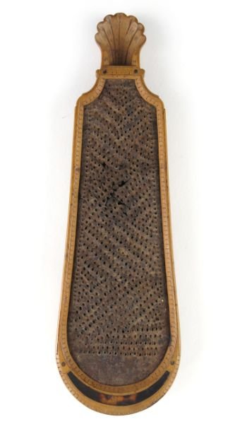 Antique French Nutmeg Grater: Antique French Nutmeg Grater18th or early 19th century, likely a fruitwood, original punched metal grate, carved wood case with tortoise shell inlay, carved shell dispenser, the verso with carved mott