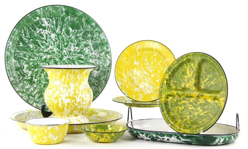 Nine Pieces of Rare Yellow and Green Graniteware: Nine Pieces of Rare Yellow and Green Granitewareto include: (2) large round serving platters, one yellow and one green (17.75 in.); a yellow agateware plate, soup bowl, and spittoon (9.5 x 8.75 in.) (