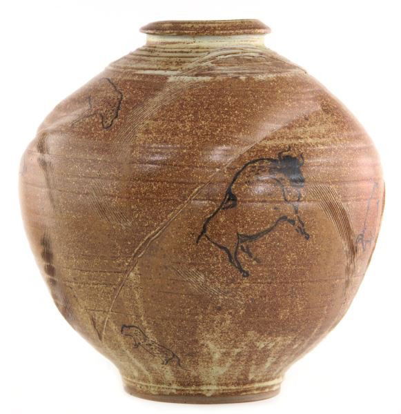 Large Earthenware Vessel with Bison Theme: Large Earthenware Vessel with Bison Themeby Mary Mikkelen and Henry Pope, incised monogram signatures on base, turned and molded with speckled brown glaze with pictograph style renderings of animals.1