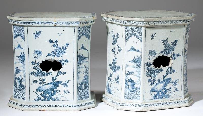 Pair of Antique Chinese Garden Seats: Pair of Antique Chinese Garden Seats 19th century, having an octagonal top with conforming paneled pedestal base, each panel decorated, in under-glaze blue, with alternating floral and landscape scene