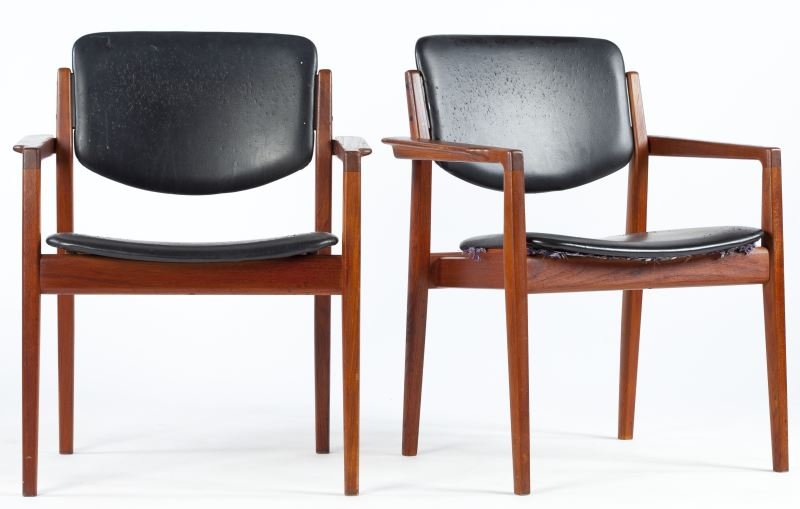 Finn Juhl, Pair of Lounge Chairs: Finn Juhl, Pair of Lounge Chairs(Danish, 1912-1989), Carl Hansen for France and Sons, Denmark, circa 1960, distributed through John Stuart Inc, teak and black naugahyde, silver and black labels with e