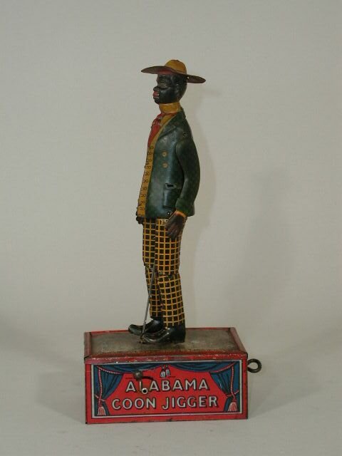 "Alabama Coon Jigger Tombo", by Ferdinan: "Alabama Coon Jigger Tombo", by Ferdinand Strauss, tin chromo litho wind-up toy, wear to platform, not working well, 10.75"h