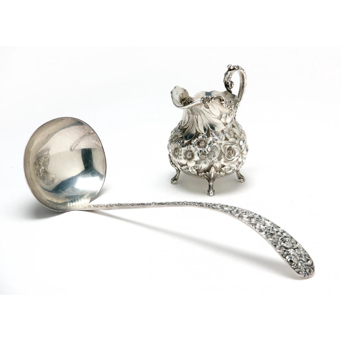 Two Stieff "Rose" Sterling Silver Hostess Items: the first a cream jug with 1925 date symbol, no monogram (4.25 in.; 5.35 troy oz.); the second a soup ladle, no monogram (12.5 in.; 5.9 troy oz.). Estate of Connie Van Pelt, Fond du Lac, WI Additional