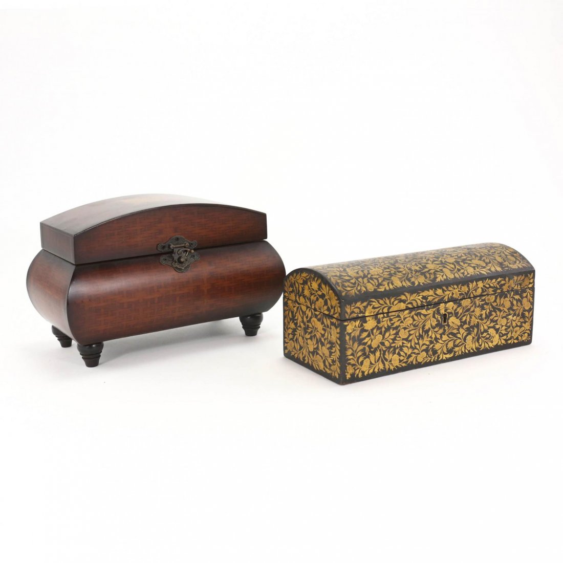 Two Contemporary Decorative Boxes: to include one stylized wooden casket one four turned feet and one gilt and lacquer decorated box. Taller 7 x 9.5 x 6 in.