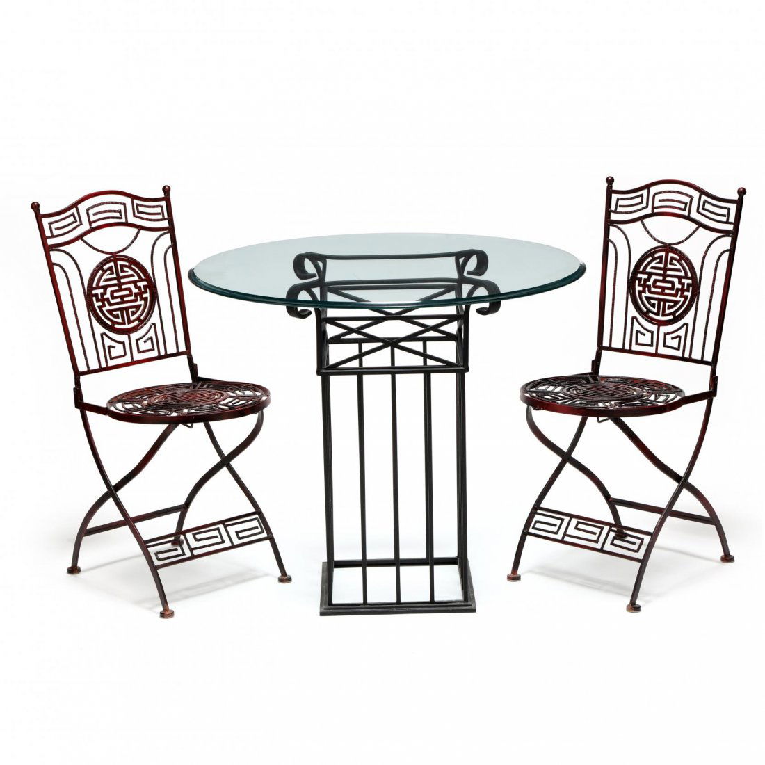 Contemporary Iron Table and Chairs: late 20th century, column form pedestal base in painted iron with circular beveled glass top, together with a pair of Chinese style folding metal chairs with red paint. 30.5 x 36 in.