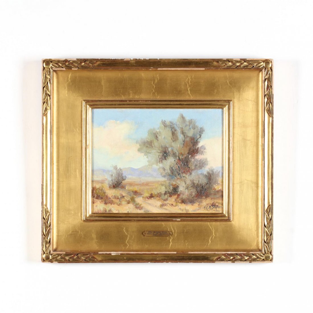 Vera C. M. Staples (CA, 1883-1954), The Smoke Tree: oil on board, signed at lower right, retaining artist's label on the verso, presented in an attractive hand-carved plein air gilt composition frame with gallery plaque. DOA 15 x 16 7/8 in. Private Col