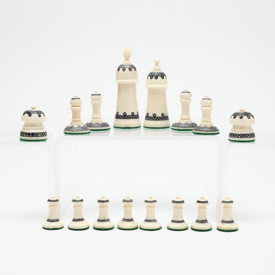 Islamic Style Camel Bone Chess Set: a contemporary copy of a 19th century Islamic design accented in red, navy, and blue ink work. King 3.25 in. Elizabeth Gann Collections, Babylon, NY and Boston, MA From the Collection of Dr. & Mrs. Ri